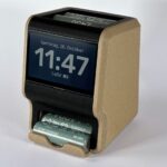 SPINC: A 3D Printed Desk Clock That Charges and Dispenses AA Batteries